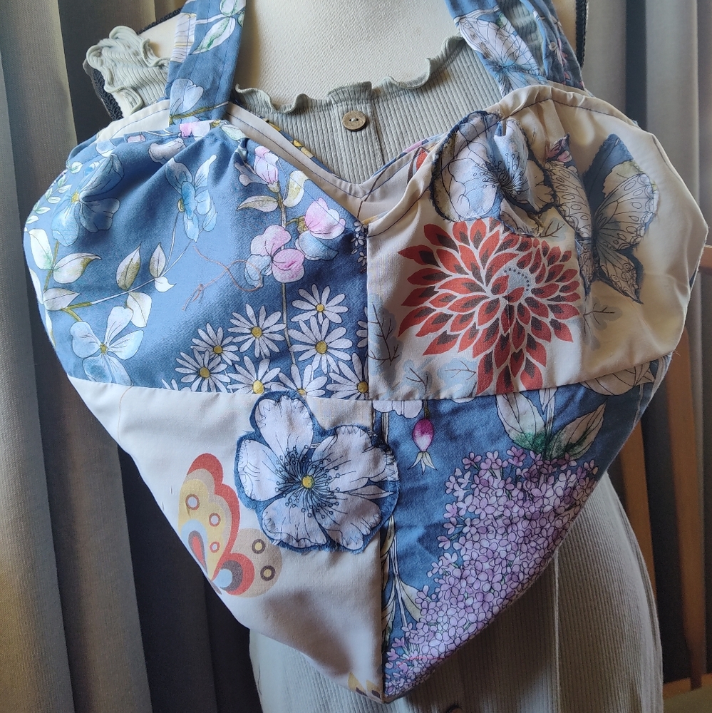 Heart shaped upcycled shoulder bag.